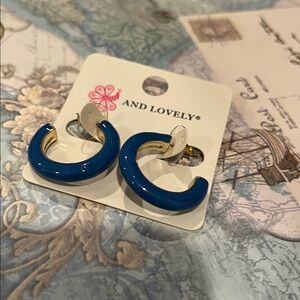 blue enamel hoop earrings from the brand "AND LOVELY